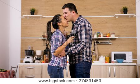 Young Happy Couple Enjoy Some Great Red Wine