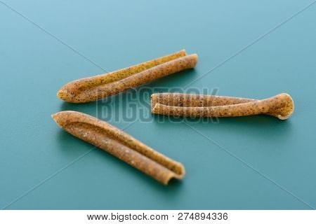 Detail Of Pasta Casarecce On Blue Background
