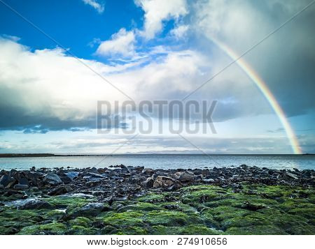 Rainbow Above The Famous Dinosaur Bay At Staffin On The Isle Of Skye