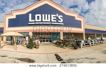 Entrance To Lowe’s Hardware Store Under Cloud Blue Sky