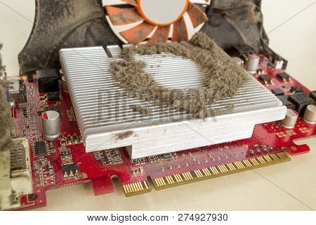 Dusty External Graphics Card Out Of A Personal Computer Case For Cleaning. A Lot Of Dust On The Cool