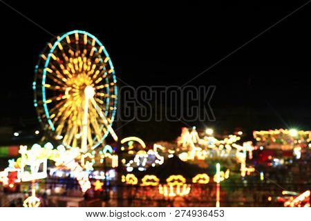 Blur Colors Light Beam Of Fluorescent Light Colorful In Ferris Wheel Festival Temple Fair Night Back