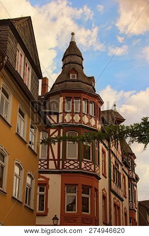 Colorful Wooden House In Historic Part Of Wetzlar City. The Typical Architecture For This Region.  W