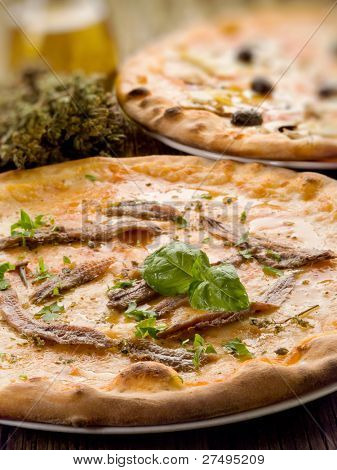 Pizza napoli en capricciosa