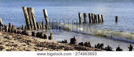 Old Decaying Breakwater In Waves At Lepe Beach, Hampshire