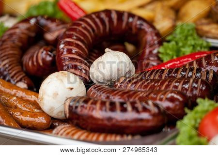 Delicious Grilled Sausages And Vegetable. Delicious Food.