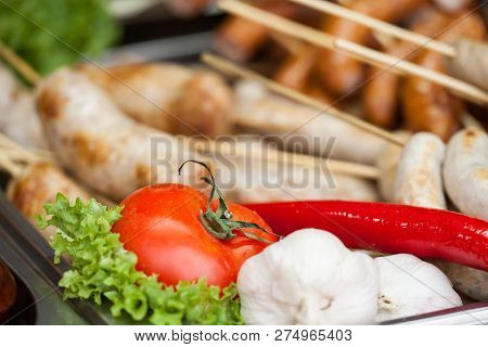 Delicious Grilled Sausages And Vegetable. Delicious Food.
