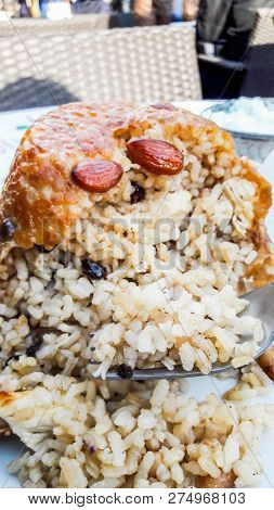Turkish Perde Pilavi / Drape Pilaf With Chicken, Almond And Raisin.