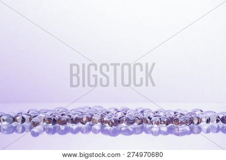 Fish Oil Supplement Capsules Isolated On White Background