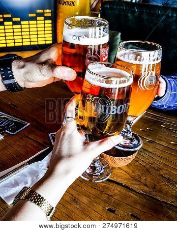 Turkey, Istanbul - December 29, 2016: Tuborg Beer With Friends.(cheers)