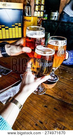 Turkey, Istanbul - December 29, 2016: Tuborg Beer With Friends.(cheers)