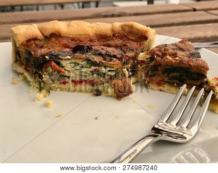 Turkish Food Quiche Tart Kis / Vegetable Pie Slice Served With Plate At Restaurant.