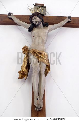 RETZBACH, GERMANY - JULY 04, 2018: Jesus on the Cross, Maria im Grunen Tal pilgrimage church in Retzbach in the Bavarian district of Main-Spessart, Germany