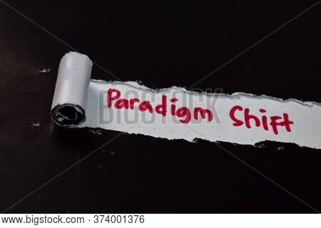 Paradigm Shift Text Written In Torn Paper