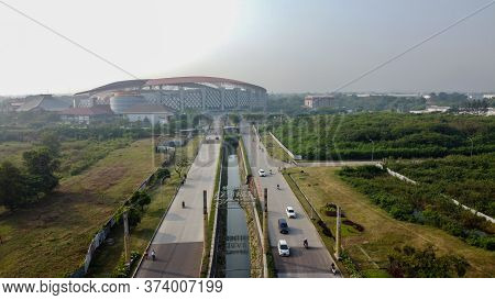 Aerial View - The Largest Stadium Of Bekasi From Drone. Indonesia. With Smog Pollution. Bekasi, Indo