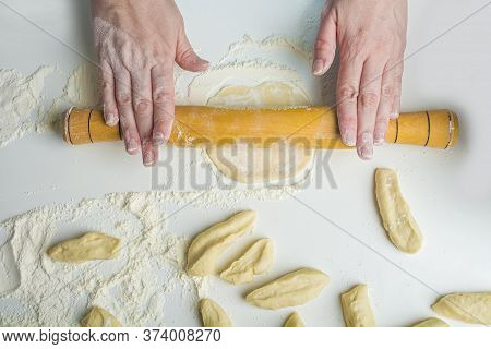 Cooking Vegetarian Dumplings With Mashed Potatoes (kreplach, Jewish Ravioli) In Home Kitchen. Female