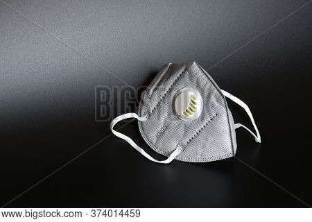 Kn95 Or N95 Mask With Valve For Protection Pm 2.5 And Corona Virus On Black Background. Prevention O