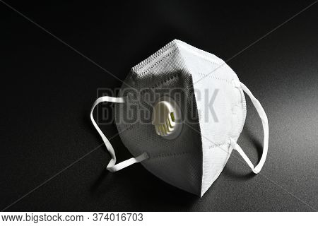 Kn95 Or N95 Mask With Valve For Protection Pm 2.5 And Corona Virus On Black Background. Prevention O