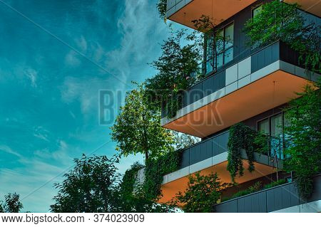 Milan, Italy, 06.29.2020: Balconies Full With Trees, Plants On The Vertical Forest (bosco Verticale)