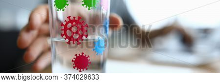 Hand Reaches For Glass Infected With Coronavirus. Acute Respiratory Infection With All Their Charact