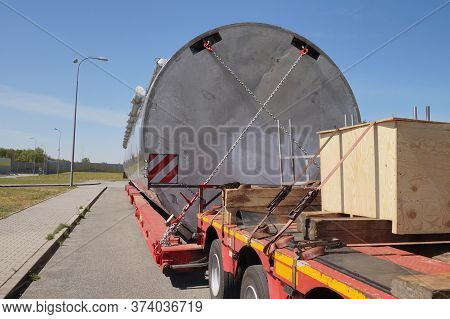 A Truck With A Special Semi-trailer For Transporting Oversized Loads. Oversize Load Or Exceptional C
