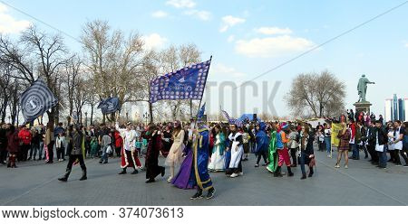 Odessa, Ukraine - 04 01 2019: Costume Demonstration Of Artists With Banners In Front Of A Crowd Of P