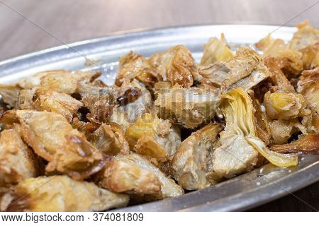 Salt Fried Artichokes On A Metal Tray