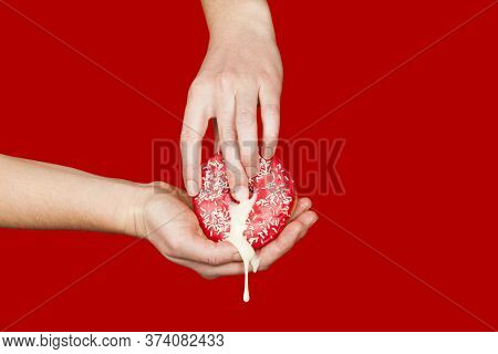 Female Hands And A Donut On A Red Background As A Symbol Of Masturbation And Foreplay (prelude) Befo