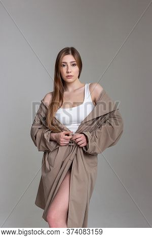 Attractive Caucasian Girl With Long Hair Looking At Camera. Beauty Portrait, Model Tests Of Pretty F