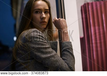 Girl In Grey Suit Posing On The Town Street