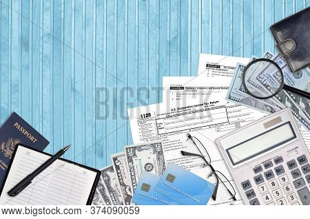 Irs Form 1120 U.s. Corporation Income Tax Return Lies On Flat Lay Office Table And Ready To Fill. U.