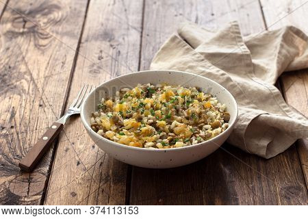Traditional Middle Eastern Dish, Mujadara Of Lentils, Rice And Fried Onions On Wooden Table, Top Vie