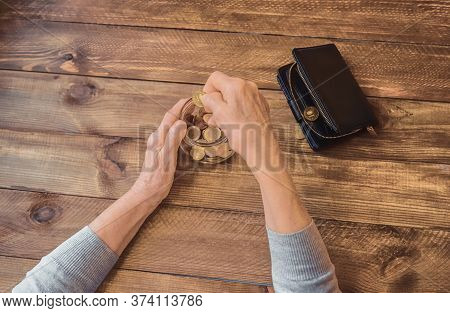 Old Wrinkled Hands On Walking Frame. Hands Of A Standing Senior Woman Leaning On A Rollator. Pension