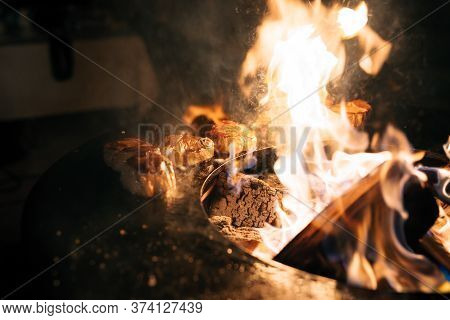 Steaks Are Grilled In The Flames Of Fire.