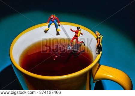recreation activities, miniature divers diving in a hot steamy cup of tea