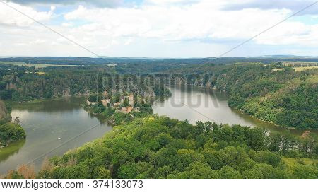 Aerial View On Czech Medieval Castle Zvikov, Situated On Rocky Outcrop Above The Confluence Of Two R