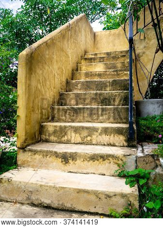 House Frontyard Cultured Veneer Stone Work Siding And Rod Iron Stairs