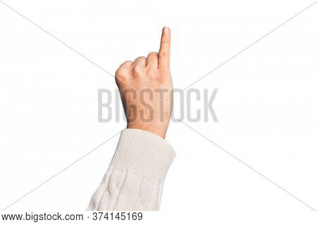 Hand of caucasian young man showing fingers over isolated white background showing little finger as pinky promise commitment, number one