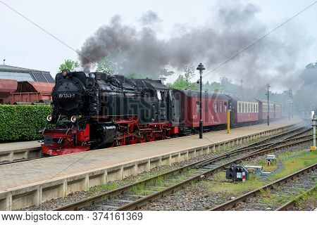 Wernigerode, Germany - May 23, 2020: Locomotive And Carriages Of The Brockenbahn In The Westerntor S