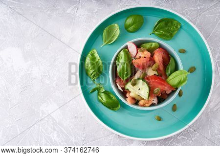 Healthy Food. Mix Salad Of Fresh Summer Vegetables In Bowl, Fresh Basil, Tomato, Onion, Cucumber, Se