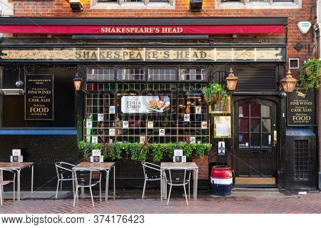 LONDON, UK - NOV 5, 2012: Facade of Shakespeare's Head, a traditional British London pub built in 1735, one of London's most famous pubs