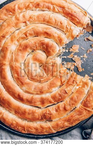 Filo Spinach And Feta Twist Pie In The Iron Pan After Oven. Authentic Greek Bakery. With Spinach, Mi