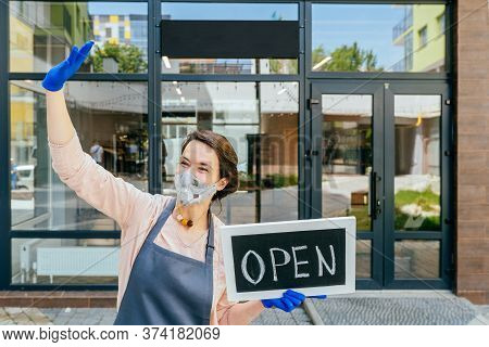 Business Owner Woman Wear Protective Face Mask Holding Open Sign At Her Zero Waste Grocery Shop Outd