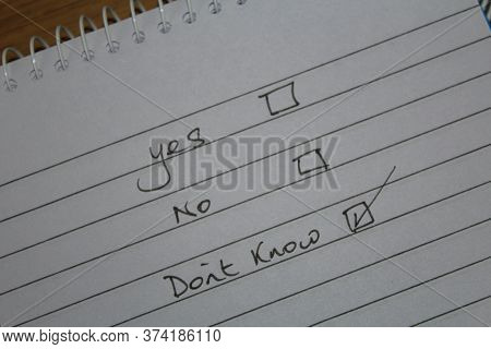 Yes No Don't Know Written On Note Shows Person Has No Clue Has A Poor Understanding And Cannot Answe