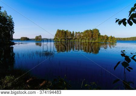 Scenes Of The Beautiful Siljan Lake And Its Rural Surrounding On A Sunny Summer Morning.