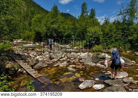 Babha River, Irkutskaya Oblast, Russia - 17 June 2020: Mountain Stream With Crystal Water In Forest 