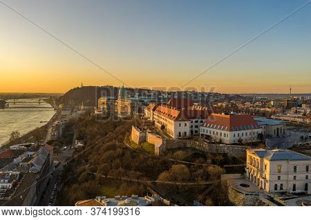Aerial Drone Shot Of Buda Castle On Buda Hill During Budapest Sunrise Morning Glow