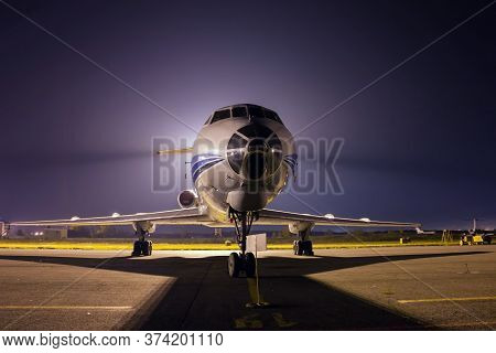 Airplane Front Close-up At Night Airport Apron