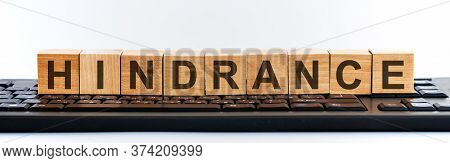 Hindrance Word In A Wooden Blocks. Hindrance Concept