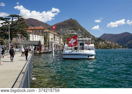 Lugano, Switzerland - April 17, 2018. City Of Lugano At The Lake Lugano On A Spring Sunny Day. View 